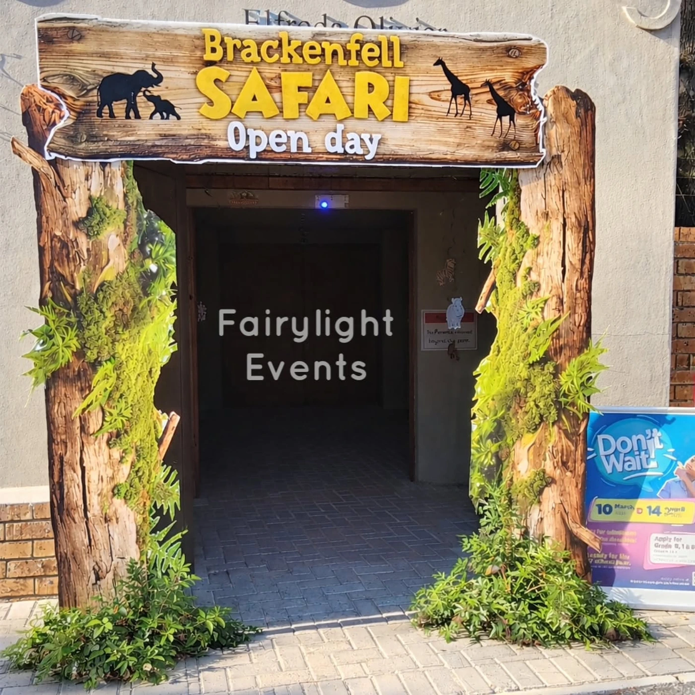 Safari themed entrance installation for a school open day