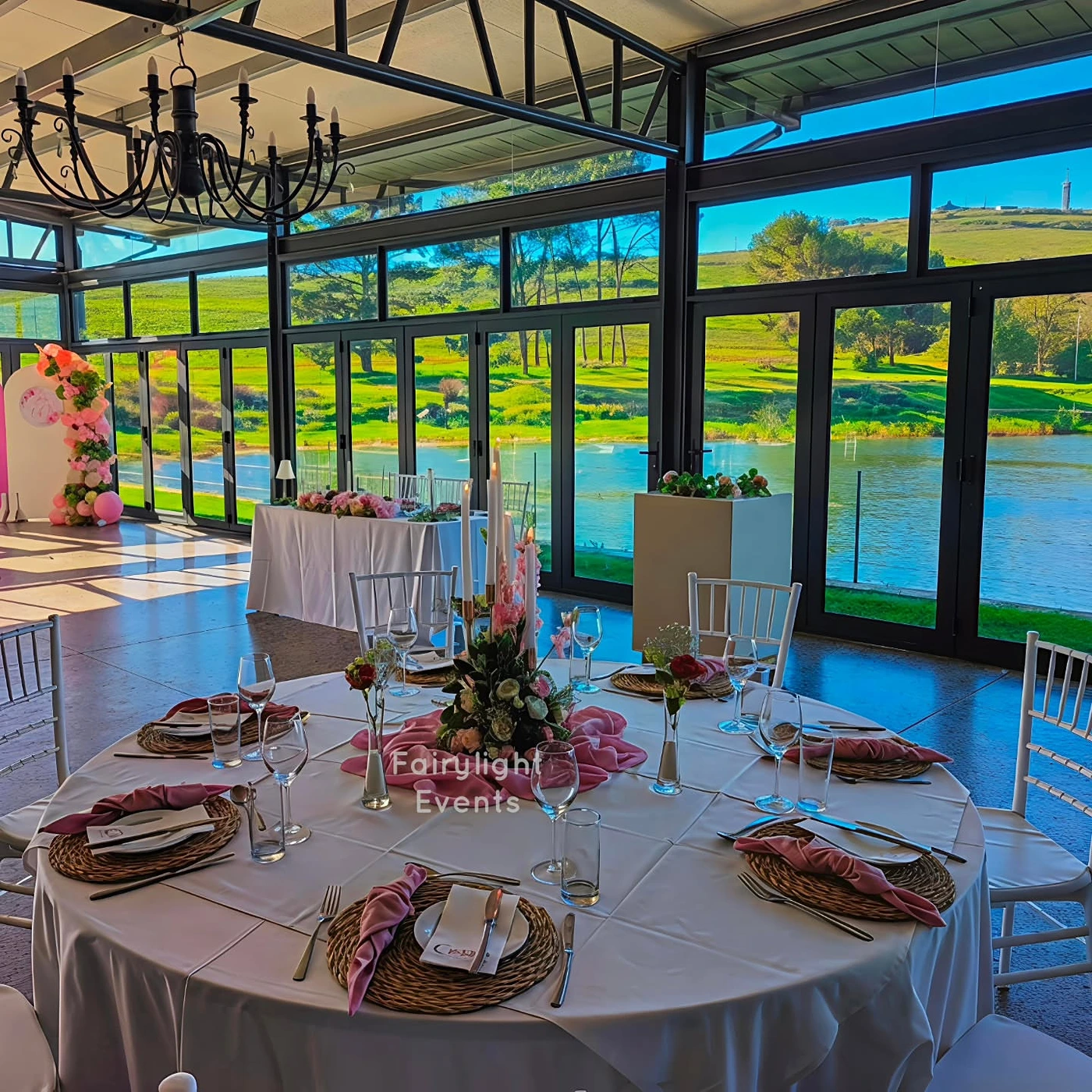 Elegant 60th birthday table setting overlooking the water